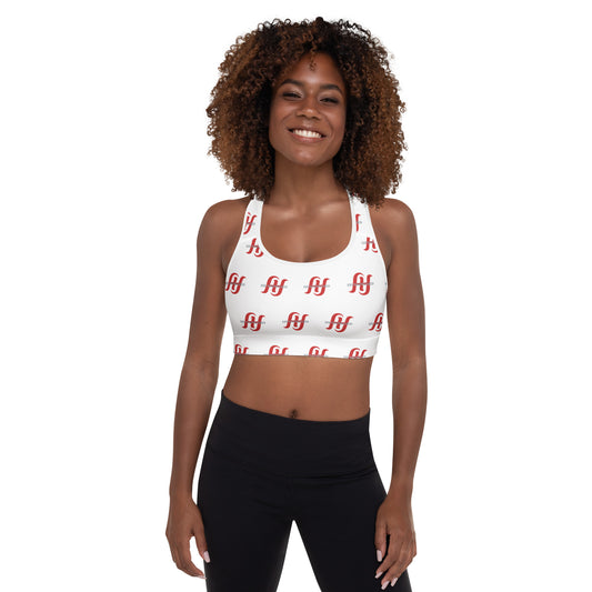 Woman wearing white Husso Hard red logo print padded sports bra