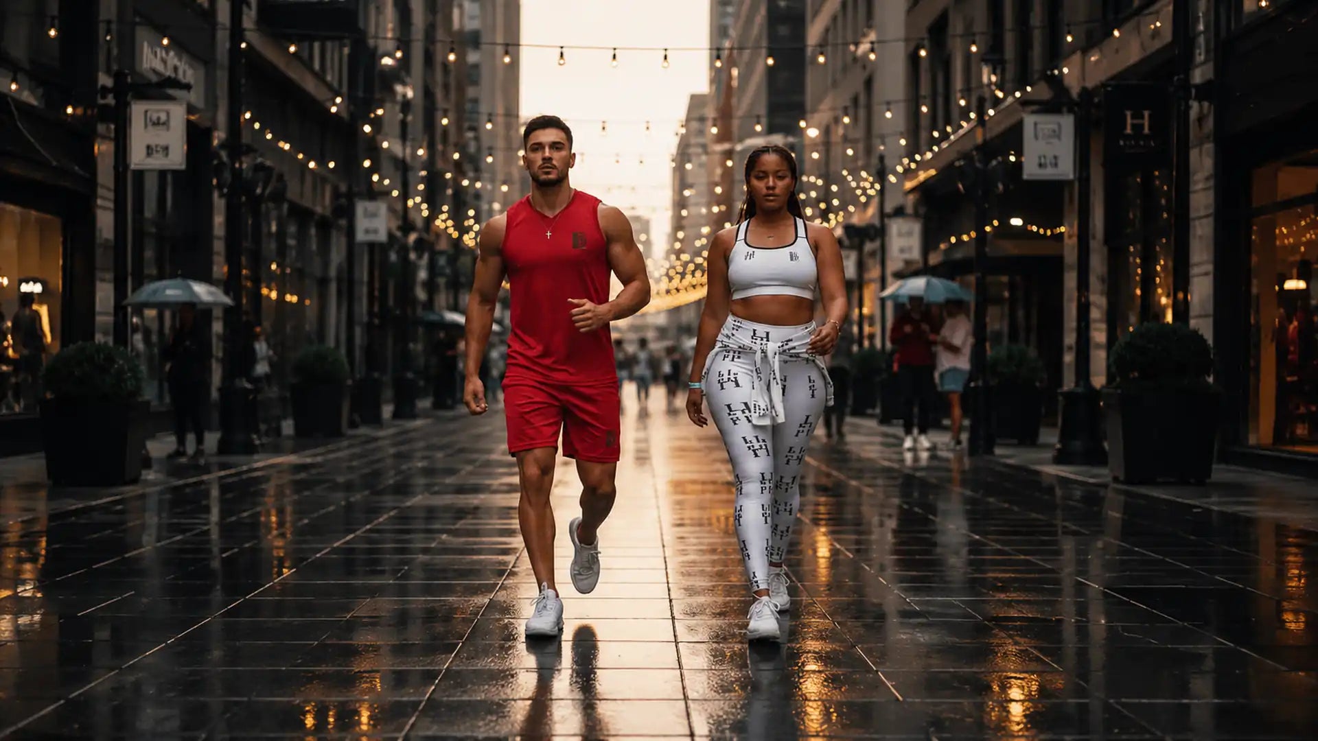 Husso Hard motivational activewear for men and women with red training outfit and white logo leggings.