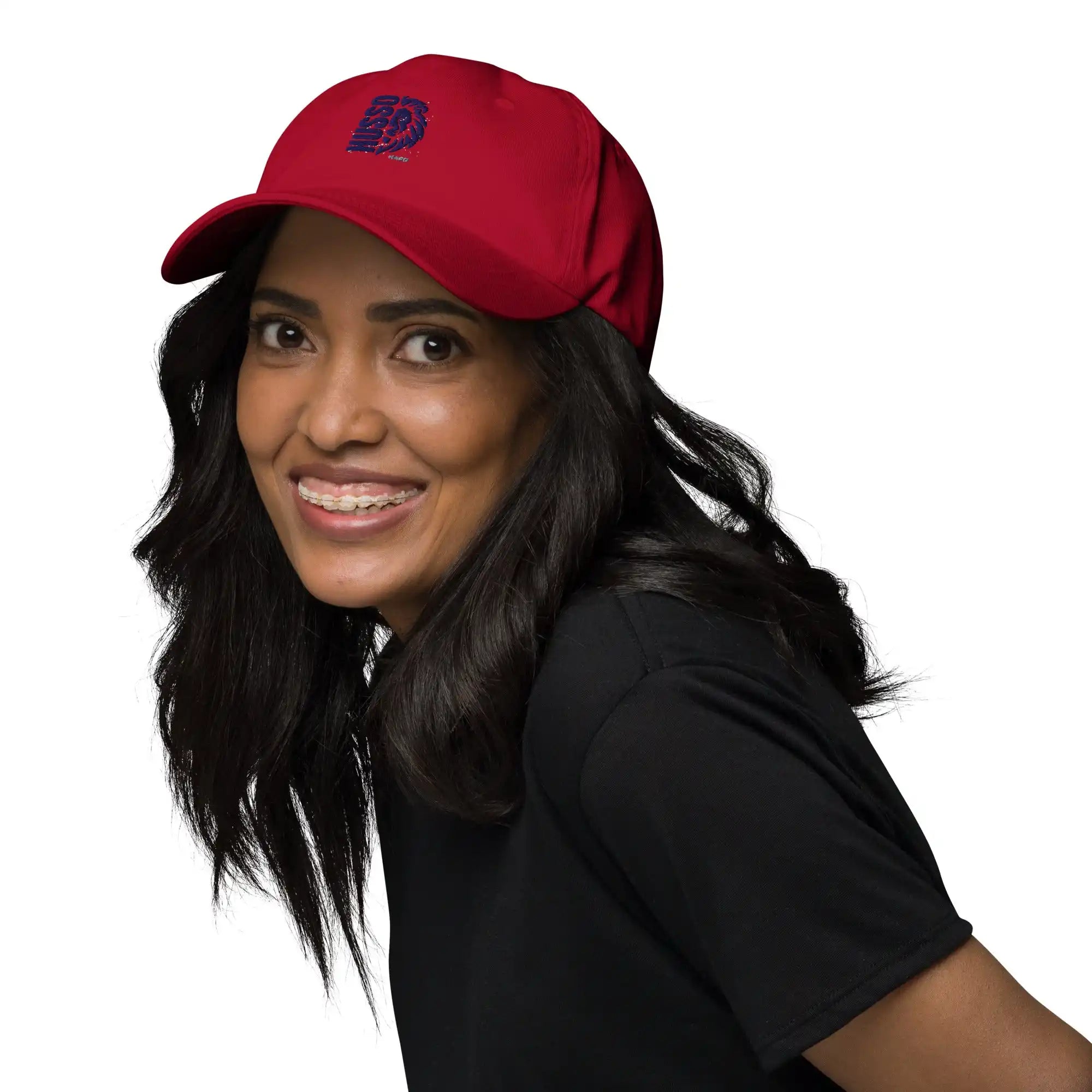 Woman wearing red Husso Hard baseball cap with black t-shirt